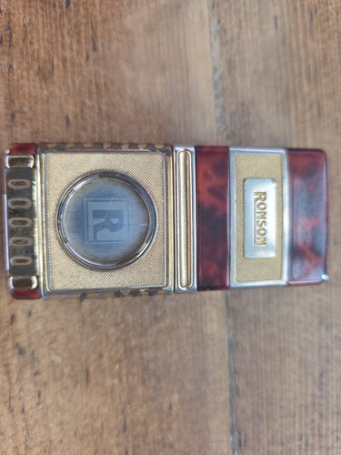 Ronson cigar lighter with - cigar,