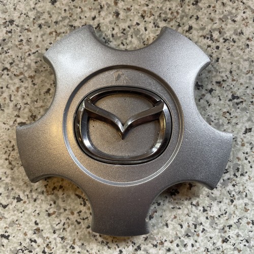 Mazda alloy wheel centre - 6,