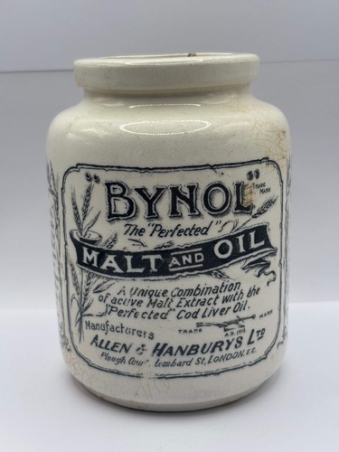 Old stoneware advertising jar
