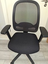 Gray office desk and black office chair