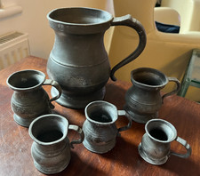 ANTIQUE set GRADUATED PEWTER