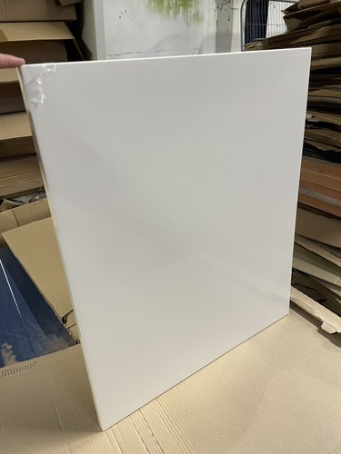 600mm cream gloss slab kitchen - cream,
