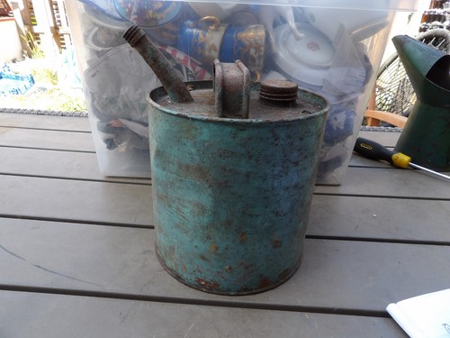Vintage paraffin pouring can