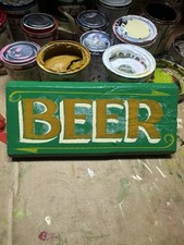 Hand painted  “Beer”sign writing sign in green 