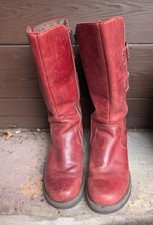 Fly London stylish calf length red boots with 2 buckles and zip fastener. 