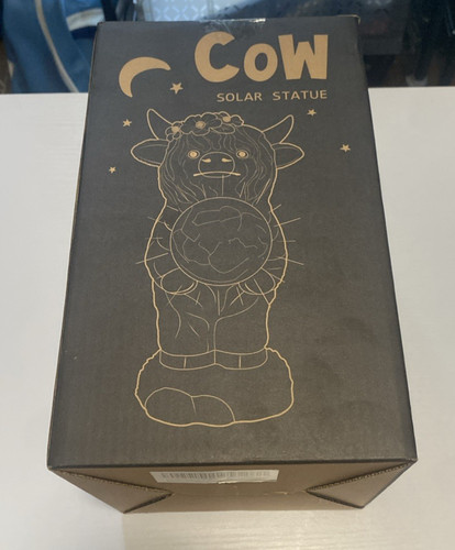 Cow solar statue - cow,