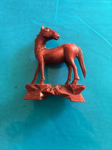 Hand carved wooden small horse - hand,
