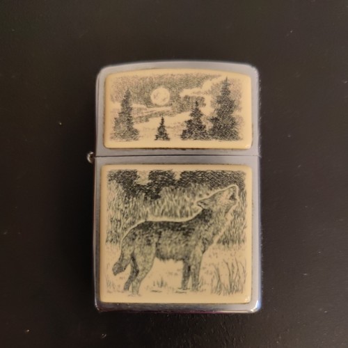 Howling wolf scrimshaw - wolf, zippo