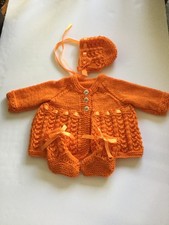 New hand knitted 3 piece babies matinee set in orange dk yarn to fit 16"
