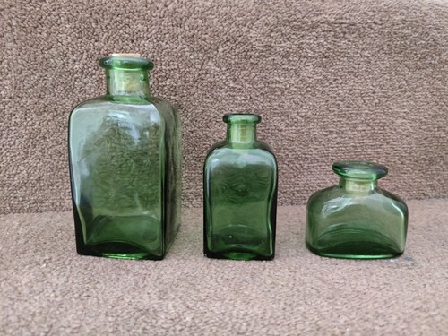 Vintage green glass bottles