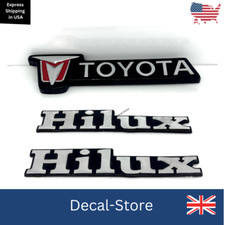 Toyota Hilux RN30 RN40 Front Grille & Both Fender Badge Emblems 1979-84