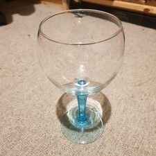 Bombay Sapphire blue stemmed Gin and tonic glass.
