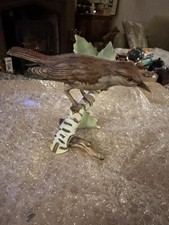 Small Bird On A Twig Figurine