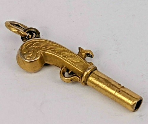 Antique yellow metal flintlock