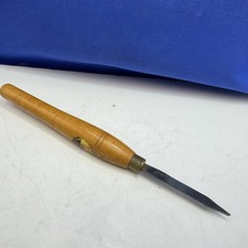 Carpenters Turning Chisel By