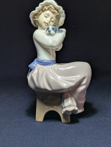 Nao lladro girl cuddling - lladro,