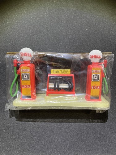 Vintage shell gas pumps tire - pumps,