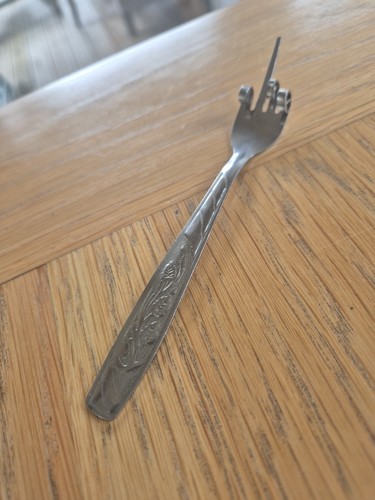 Unusual metal pickle fork - unusual,