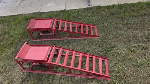 Pair hydraulic lift car - of,