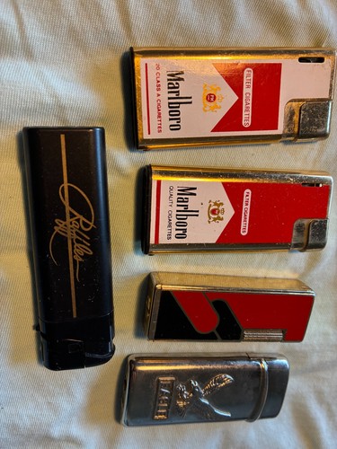 Old used cigarette lighters - used,