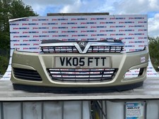 VAUXHALL ASTRA HATCHBACK 5DR CLUB MK5 H 2005 GOLD 4PU FRONT BUMPER MARKS