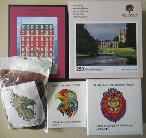 Various wooden jigsaw puzzles - wooden,
