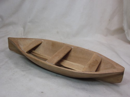 Vintage carved wooden canoe - carved,