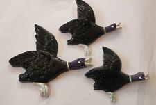 Flying ducks plaster wall