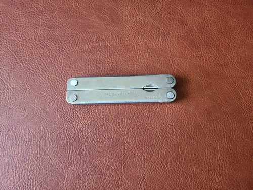 One vintage leatherman - one,