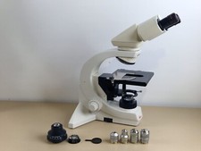 leica DMLS microscope with 3 plan apochromat + 1x fluotar objective