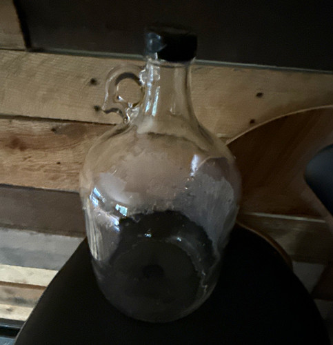One gallon clear glass carboy - one,