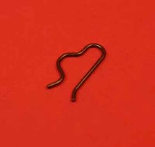 Retaining spring for spool