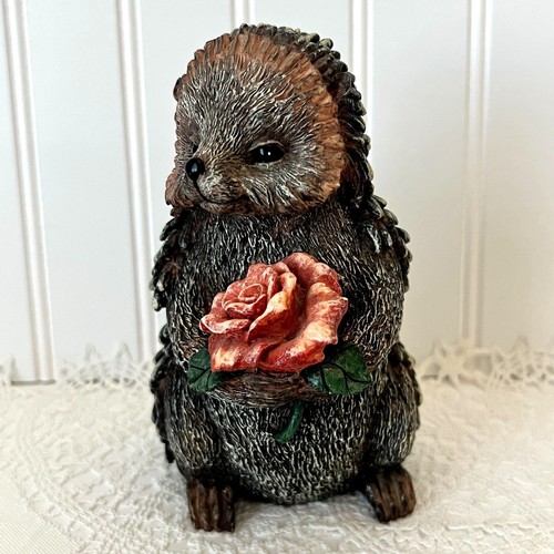 Hedgehog holding rose - hedgehog,
