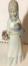 vintage porcelain figurine girl holding a dog Porcelanas Miquel Requena S.A.