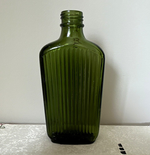 Green ribbed glass bottle - green,