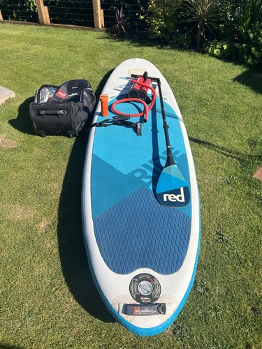 Red inflatable paddle - board,