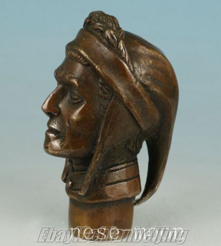 Vintage old bronze hand - old, carved