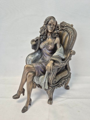 2001 bronze sitting woman - sitting,