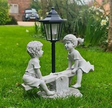 Garden Ornaments Solar Boy and Girl Seesaw Decor outdoor Indoor Stone Effect
