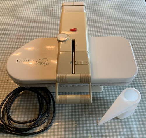 Lotus elna ironing - by,