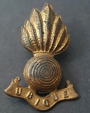 BRITISH ARMY  ROYAL ARTILLERY OFFICER'S UBIQUE BRASS COLLAR BADGE