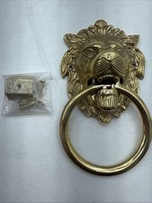 Brass Lions Head Door