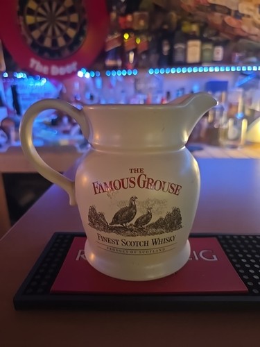 The famous grouse whisky - the, water