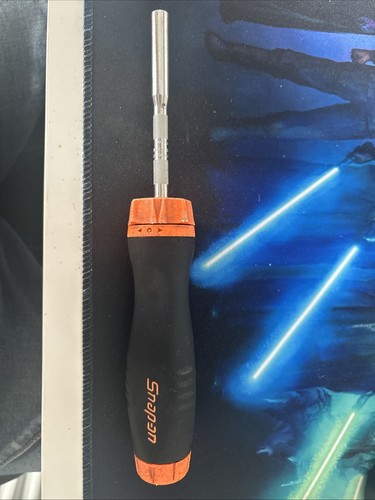 Snap ratcheting magnetic - on,