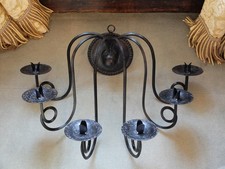 Vintage pair of six-armed wrought iron metal wall sconce candle holders