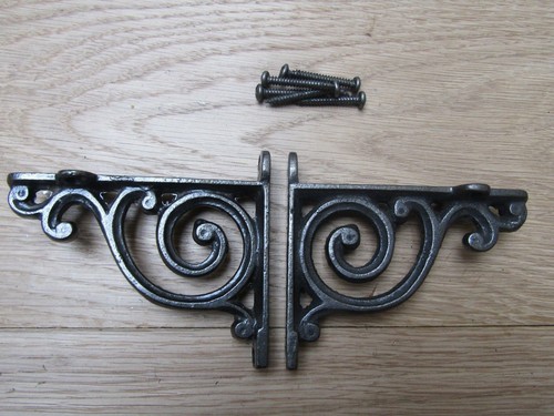 Pair swirl antique - of,