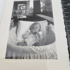 Photo Baby in Wicker Bassinet