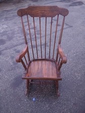 An Old Rocking Chair In Good
