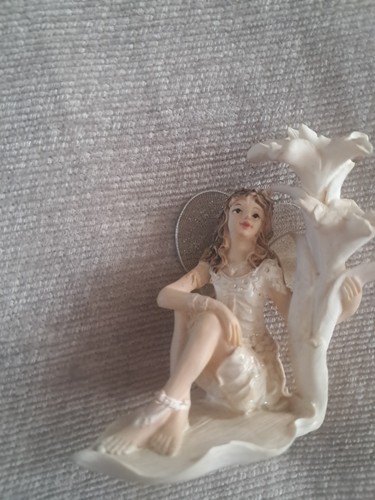 Fairy sitting next - next, lily