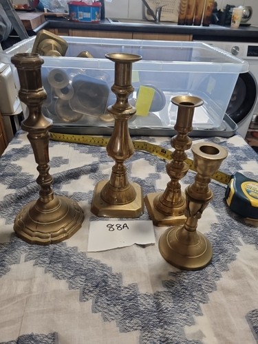 Odd brass candlesticks - 4,